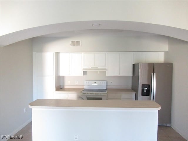 kitchen featuring light tile patterned flooring, stainless steel refrigerator with ice dispenser, white electric range oven, white cabinetry, and a center island