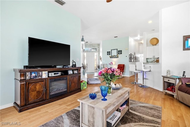 living room featuring light wood-type flooring