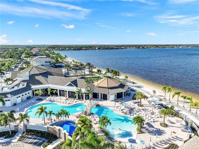 birds eye view of property featuring a water view