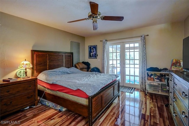 bedroom with access to exterior, hardwood / wood-style flooring, french doors, and ceiling fan