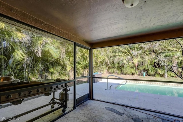 view of unfurnished sunroom