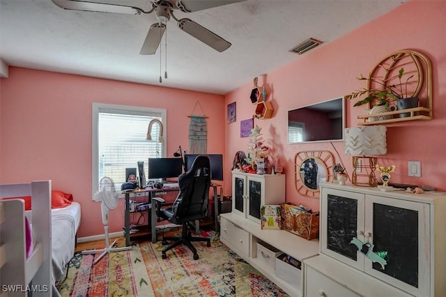 home office with ceiling fan