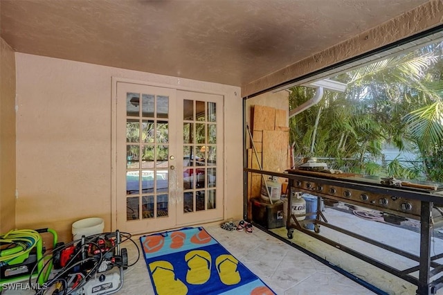 sunroom / solarium with french doors