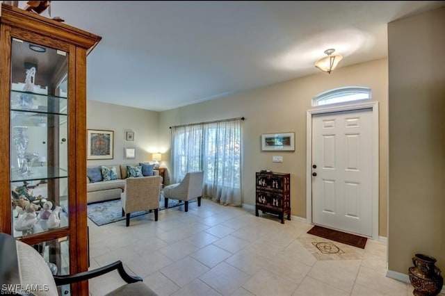 entrance foyer with light tile patterned flooring