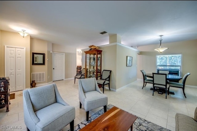 living room with light tile patterned floors