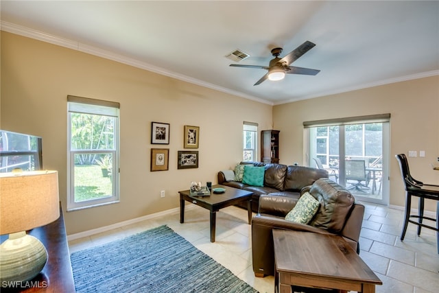 living room featuring crown molding, ceiling fan, and light tile patterned floors