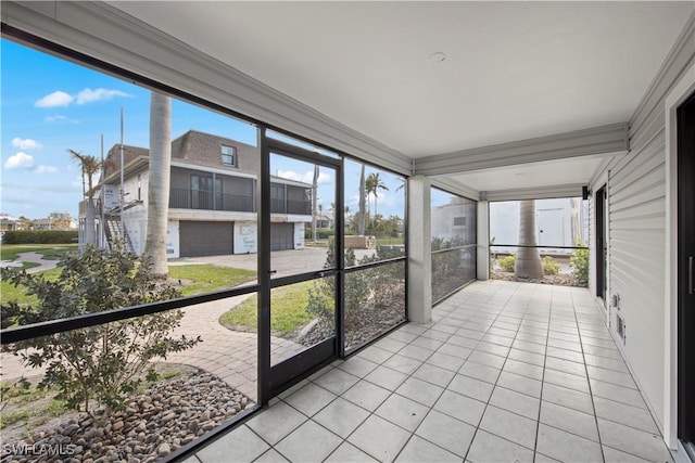 unfurnished sunroom with a healthy amount of sunlight