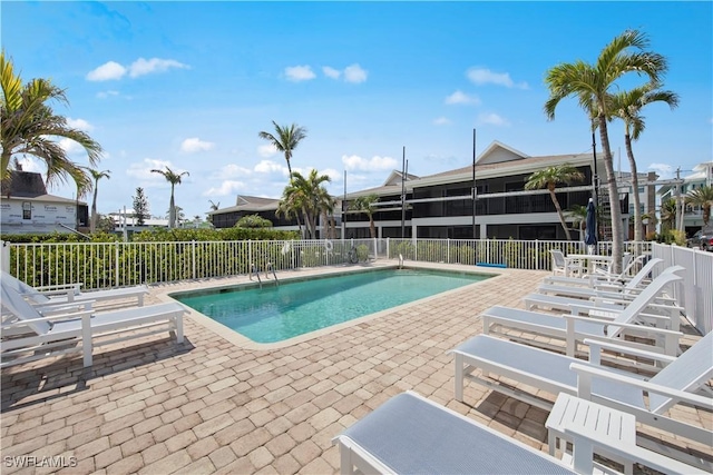 view of swimming pool featuring a patio