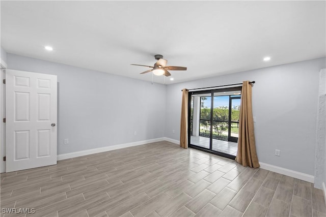 spare room with ceiling fan