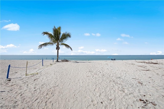 view of water feature with a beach view