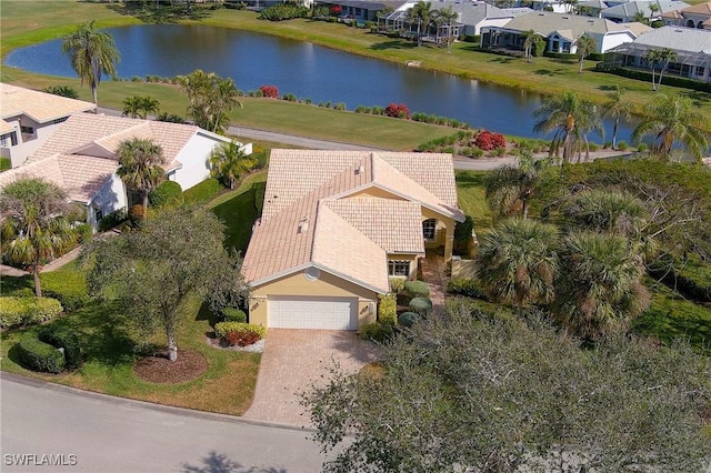 bird's eye view with a water view