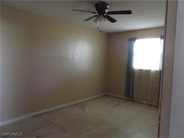 14 Richmond Ave N, Lehigh Acres, FL 33936 - spare room featuring ceiling fan