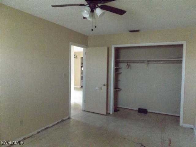 14 Richmond Ave N, Lehigh Acres, FL 33936 - unfurnished bedroom with ceiling fan and a closet