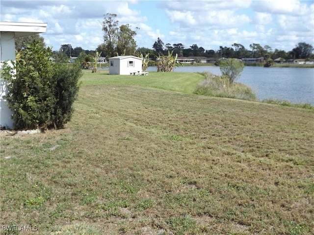 14 Richmond Ave N, Lehigh Acres, FL 33936 - view of yard featuring a water view