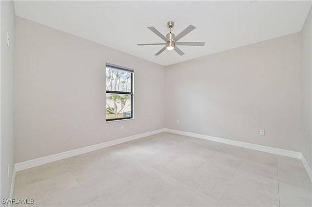 spare room with ceiling fan