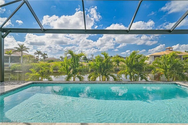 view of pool with a lanai