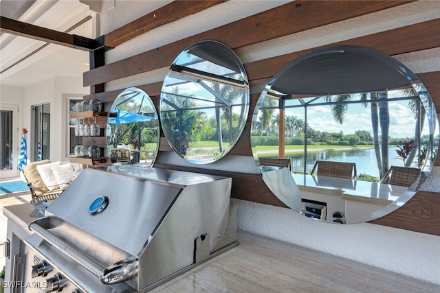 view of patio featuring a water view and glass enclosure