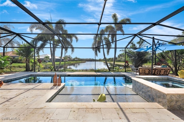 view of swimming pool featuring a water view, an in ground hot tub, a lanai, and a patio area