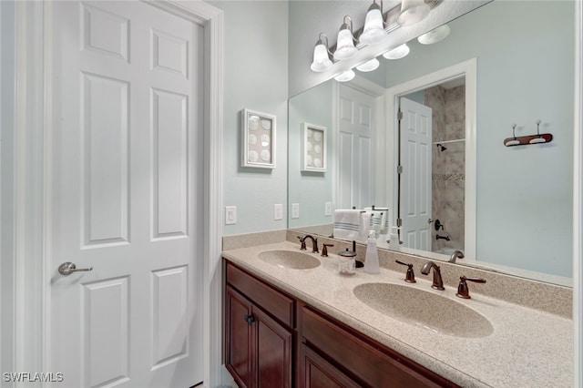 bathroom with vanity and tub / shower combination