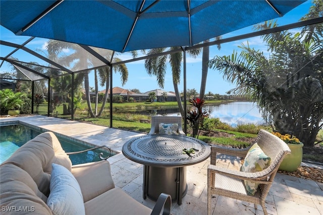 view of patio with a water view and glass enclosure