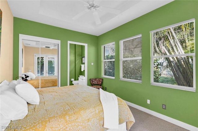 carpeted bedroom featuring french doors and ceiling fan