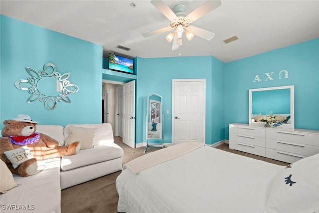 carpeted bedroom featuring ceiling fan