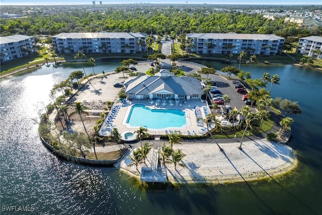 birds eye view of property featuring a water view