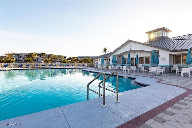 view of pool with a patio area