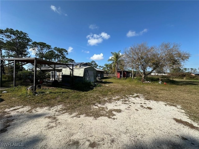 view of yard featuring a carport