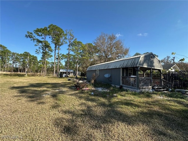 view of yard featuring a deck