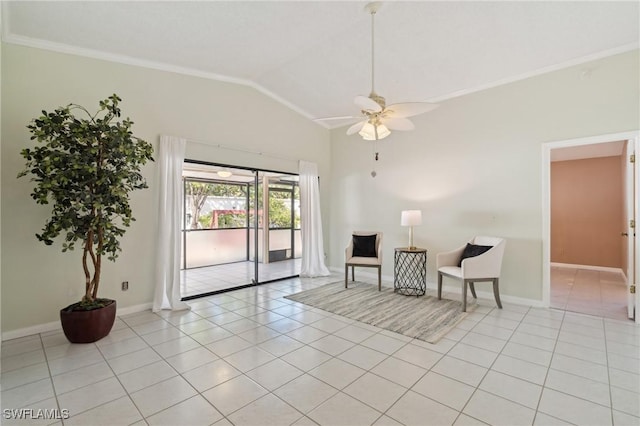 sitting room with crown molding, ceiling fan, vaulted ceiling, and light tile patterned floors