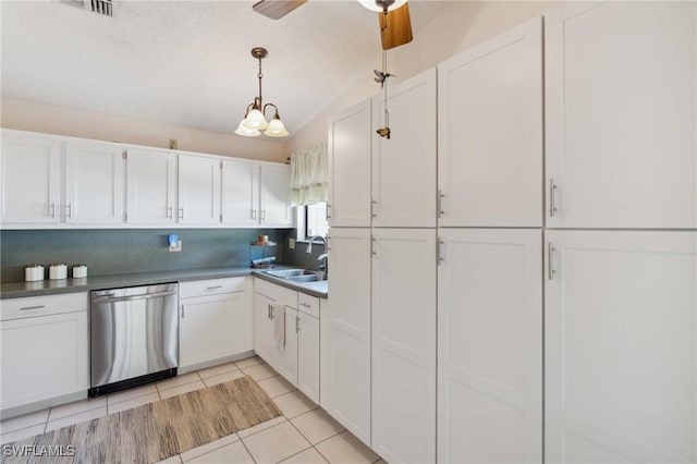 kitchen with light tile patterned flooring, sink, dishwasher, ceiling fan, and white cabinets