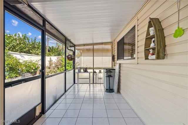 view of unfurnished sunroom