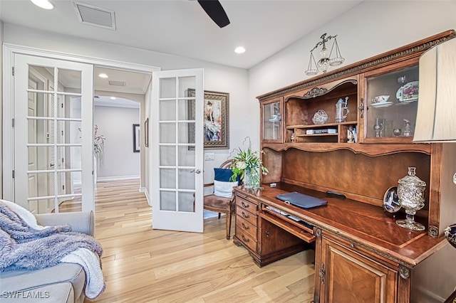 office space with french doors, recessed lighting, visible vents, a ceiling fan, and light wood-type flooring