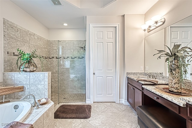 full bath with a garden tub, visible vents, vanity, tiled shower, and tile patterned floors