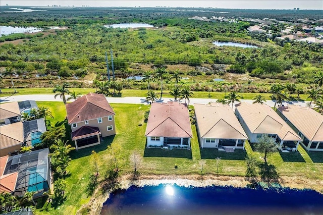 aerial view with a residential view and a water view