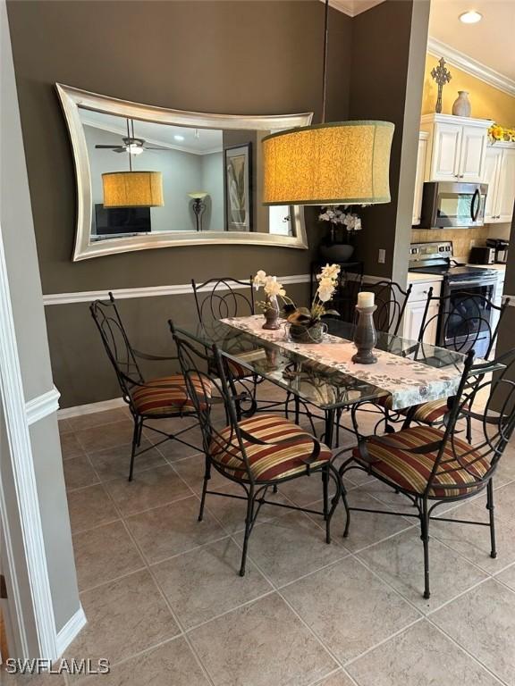 tiled dining space with ornamental molding