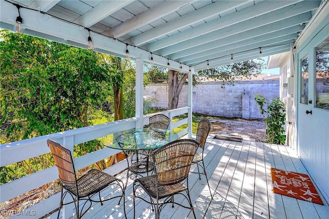 wooden deck with outdoor dining area