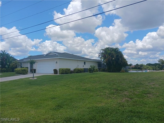 view of side of home with a garage, central air condition unit, and a lawn