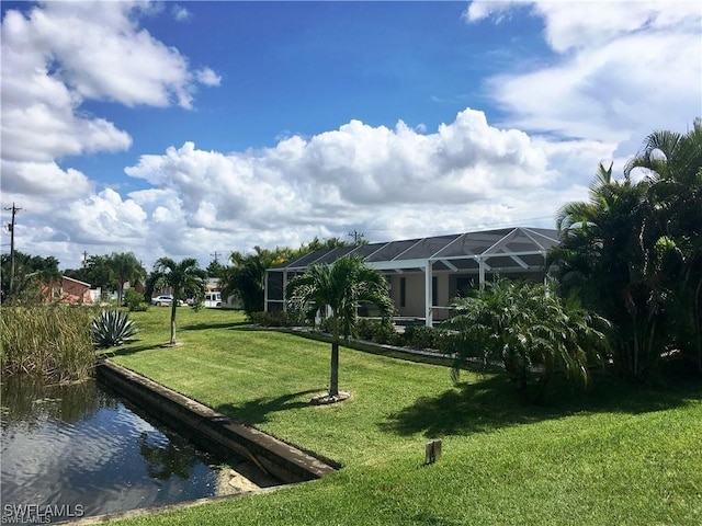 view of yard with a lanai