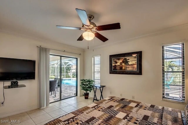 unfurnished bedroom with crown molding, access to outside, ceiling fan, and light tile patterned floors