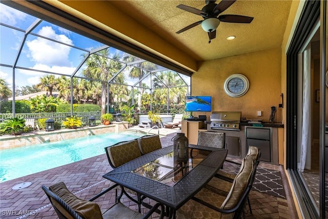 view of patio featuring a fenced in pool, a lanai, area for grilling, grilling area, and pool water feature