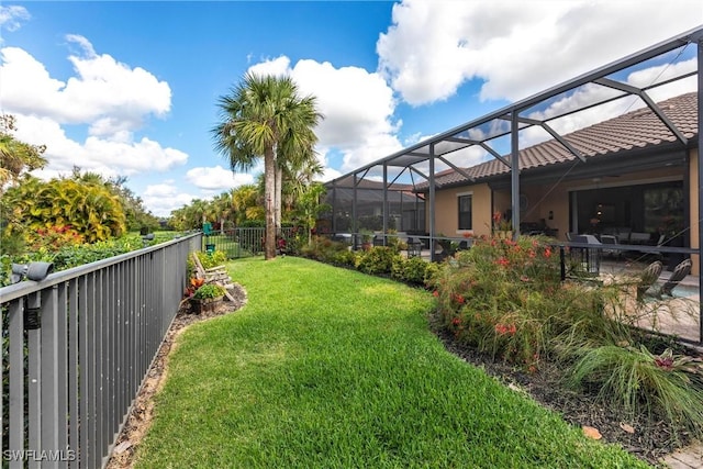 view of yard featuring a lanai