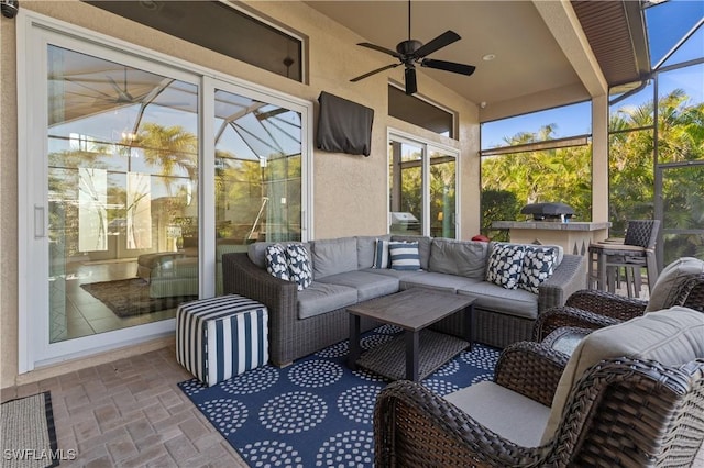 sunroom with ceiling fan