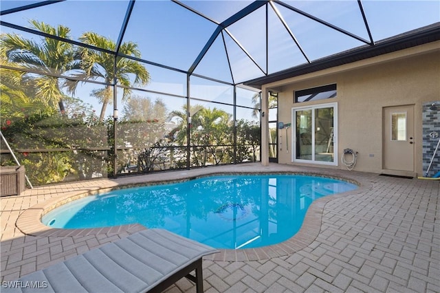 pool featuring a patio area and a lanai