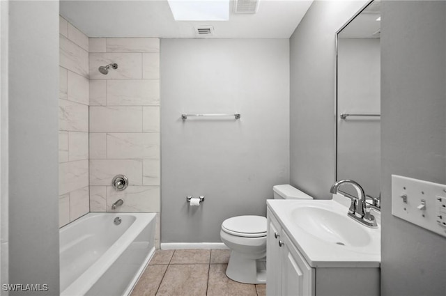 full bath featuring toilet, vanity, baseboards, tub / shower combination, and tile patterned floors