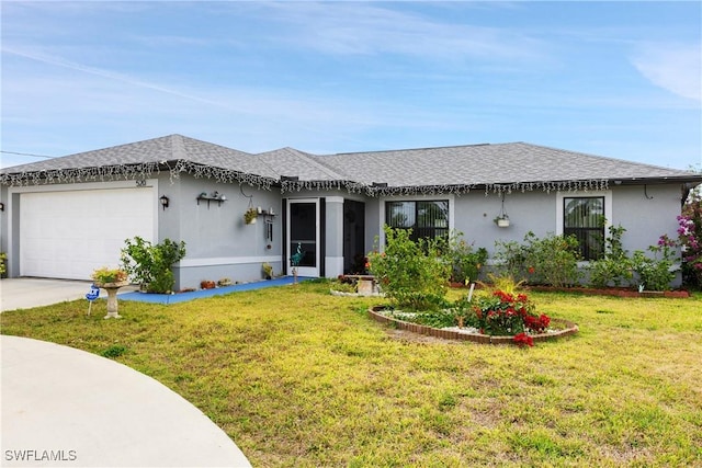 ranch-style home featuring a garage and a front yard