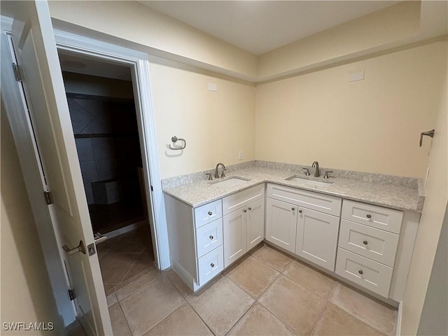 interior space featuring vanity and tile patterned flooring