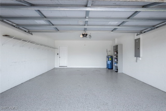 garage with a garage door opener, electric panel, and water heater