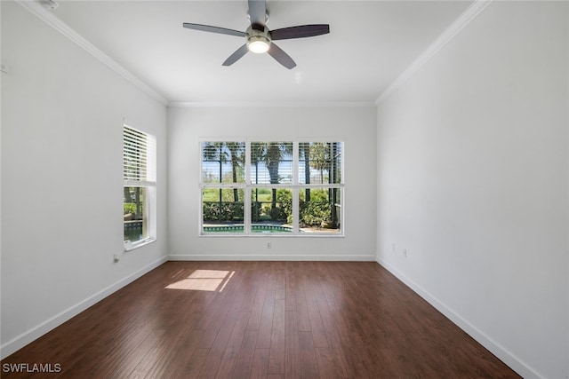 unfurnished room with ornamental molding, dark hardwood / wood-style floors, and ceiling fan